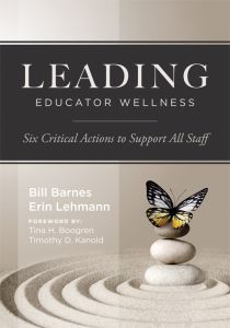 Leading Educator Wellness: Six Critical Actions to Support All Staf by Bill Barnes and Erin Lehmann; Foreword by Tina H. Boogren and Timothy D. Kanold, a black and yellow butterfly sitting on three rocks in sand.